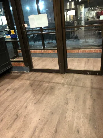 Timber-look floor at a commercial entrance