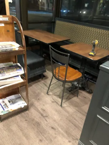Timber-look flooring around commercial seating and tables