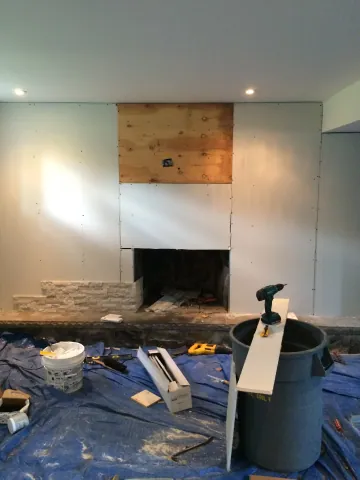 Fireplace wall during stone installation