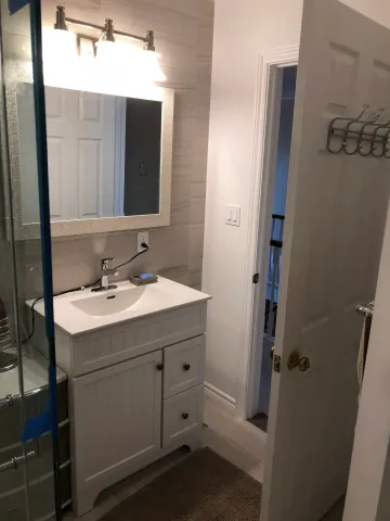 Bathroom vanity and mirror during final fitting