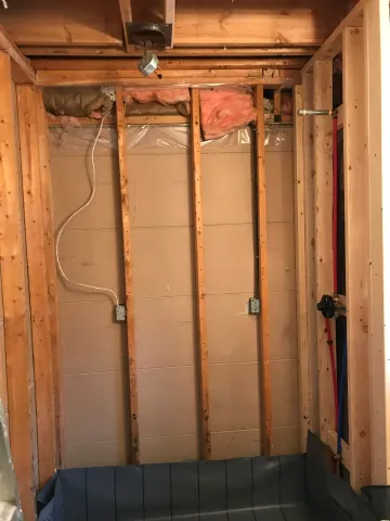 Open shower framing during bathroom renovation