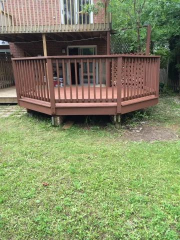Raised timber deck and railings viewed from the garden