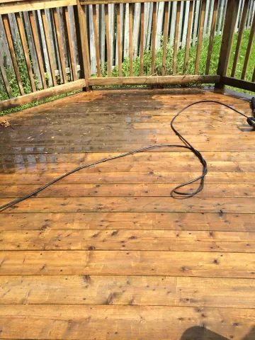 Timber deck boards during cleaning and surface preparation
